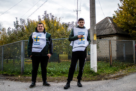 Home delivery of supplies by truck in Dnipro area to a family. Caritas Ukraine provides humanitarian aid and supports communities affected by the long-term impacts of the conflict, including emergency supplies, education and healthcareのeditorial素材