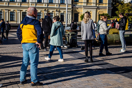 People visiting an open air exhibition and features Russian military equipment that was captured and destroyed during the 2022 Russian invasion of Ukraineのeditorial素材