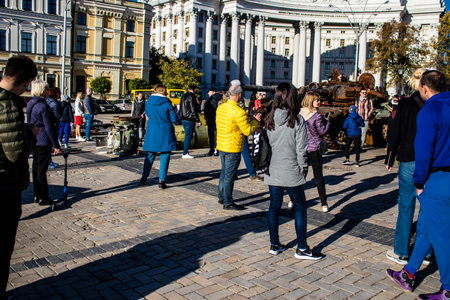 People visiting an open air exhibition and features Russian military equipment that was captured and destroyed during the 2022 Russian invasion of Ukraineのeditorial素材