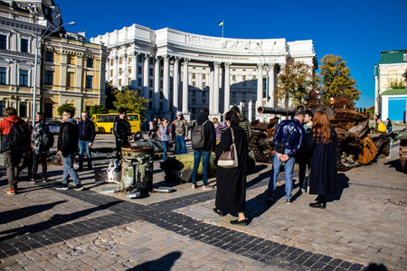 People visiting an open air exhibition and features Russian military equipment that was captured and destroyed during the 2022 Russian invasion of Ukraineのeditorial素材