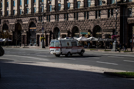 Kyiv, Ukraine - November 02, 2022 Ambulance rolling in the city center of kyiv during the war with Russia, kyiv are the target of Russian missiles and the sirens sound every dayのeditorial素材
