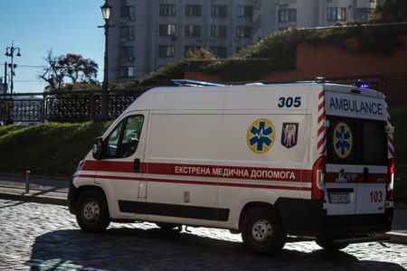 Kyiv, Ukraine - November 02, 2022 Ambulance rolling in the city center of kyiv during the war with Russia, kyiv are the target of Russian missiles and the sirens sound every dayのeditorial素材