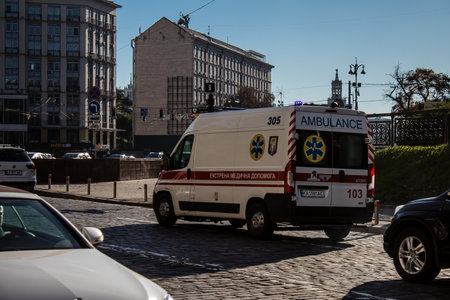Kyiv, Ukraine - November 02, 2022 Ambulance rolling in the city center of kyiv during the war with Russia, kyiv are the target of Russian missiles and the sirens sound every dayのeditorial素材