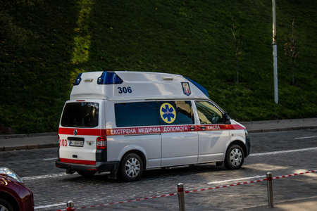 Kyiv, Ukraine - November 02, 2022 Ambulance rolling in the city center of kyiv during the war with Russia, kyiv are the target of Russian missiles and the sirens sound every dayのeditorial素材
