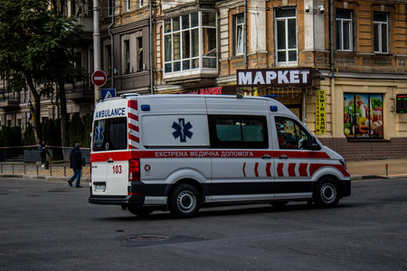 Kyiv, Ukraine - November 02, 2022 Ambulance rolling in the city center of kyiv during the war with Russia, kyiv are the target of Russian missiles and the sirens sound every dayのeditorial素材