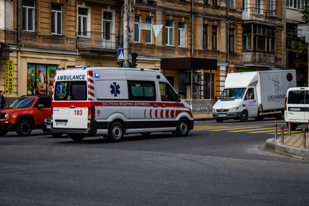Kyiv, Ukraine - November 02, 2022 Ambulance rolling in the city center of kyiv during the war with Russia, kyiv are the target of Russian missiles and the sirens sound every dayのeditorial素材