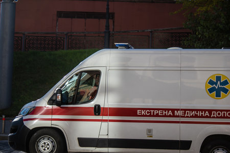 Kyiv, Ukraine - November 02, 2022 Ambulance rolling in the city center of kyiv during the war with Russia, kyiv are the target of Russian missiles and the sirens sound every dayのeditorial素材