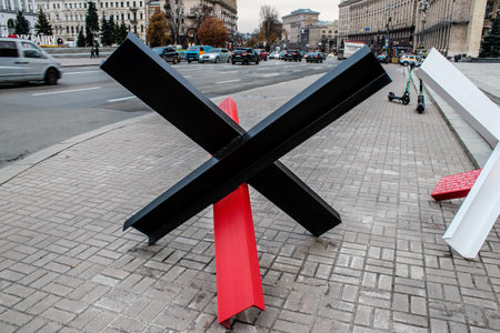 Military roadblock and obstacles in the streets Kyiv capital of Ukraine. The objective is to prevent any enemy operation. It acts as protection for friendly troops. The preparation of such a barrage is normally a priority engineer task.のeditorial素材
