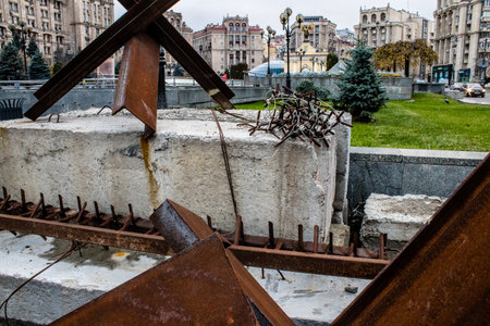 Military roadblock and obstacles in the streets Kyiv capital of Ukraine. The objective is to prevent any enemy operation. It acts as protection for friendly troops. The preparation of such a barrage is normally a priority engineer task.のeditorial素材