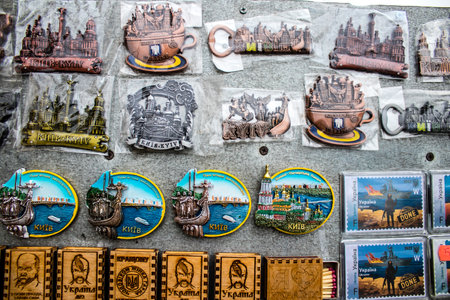 Decorative objects sold on the streets of kyiv in Ukraine, unit patches and other wartime memorabilia revolve around the military spirit and are bought by people as souvenirs on the current war against Russia. The vendors, who have sold trinkets on their のeditorial素材