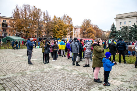 Citizens of Kherson celebrate the liberation of the city on Freedom Square in the city center. Russian troops left Kherson after a nine-month occupation and a counter offensive by the Ukrainian army.のeditorial素材