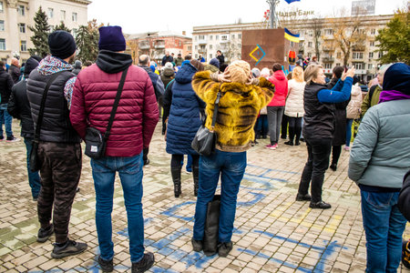 Citizens of Kherson celebrate the liberation of the city on Freedom Square in the city center. Russian troops left Kherson after a nine-month occupation and a counter offensive by the Ukrainian army.のeditorial素材