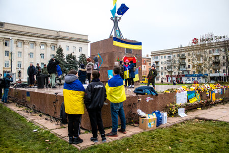 Citizens of Kherson celebrate the liberation of the city on Freedom Square in the city center. Russian troops left Kherson after a nine-month occupation and a counter offensive by the Ukrainian army.のeditorial素材