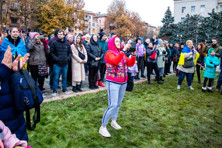 Citizens of Kherson celebrate the liberation of the city on Freedom Square in the city center. Russian troops left Kherson after a nine-month occupation and a counter offensive by the Ukrainian army.のeditorial素材
