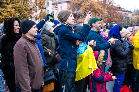 Citizens of Kherson celebrate the liberation of the city on Freedom Square in the city center. Russian troops left Kherson after a nine-month occupation and a counter offensive by the Ukrainian army.のeditorial素材