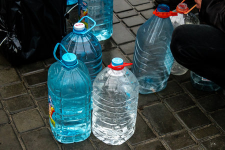 Residents of Kherson in Ukraine, collecting drinkable water at Freedom Square. International...