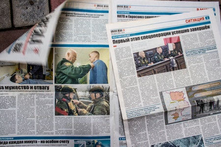 Russian newspapers discovered in Kherson airport after it was abandoned by the Russian army following the Ukrainian counter offensive. Newspapers are propaganda used by the Russian government to glorify warのeditorial素材