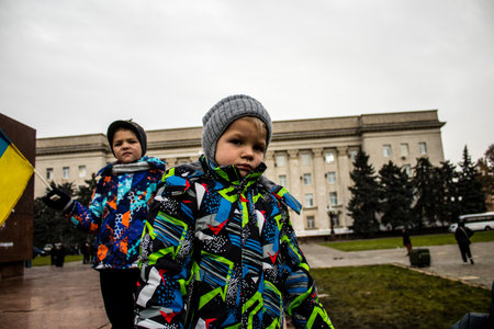 kid of Kherson celebrate the liberation of the city on Freedom Square in the city center. Russian troops left Kherson after a nine-month occupationのeditorial素材