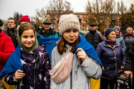 kid of Kherson celebrate the liberation of the city on Freedom Square in the city center. Russian troops left Kherson after a nine-month occupationのeditorial素材
