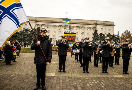 The Ukrainian Navy Band march through the streets of Kherson to celebrate the liberation of the city. Russian troops left Kherson after a nine-month occupationのeditorial素材