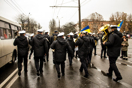 The Ukrainian Navy Band march through the streets of Kherson to celebrate the liberation of the city. Russian troops left Kherson after a nine-month occupationのeditorial素材
