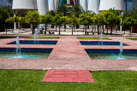 Seville, Spain - June 06, 2023 Architecture and cityscape of Cartuja Island, one of the neighborhoods of Seville, emblematic city and capital of Andalusia.のeditorial素材