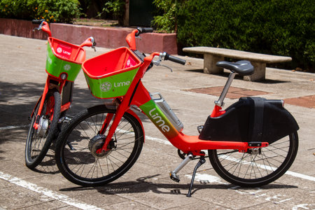 Sevilla, Spain - June 06, 2023 Accessible bicycles to hire for short periods of time, usually for a few hours parked in the streets and part of the public transport system of Sevillaのeditorial素材