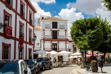 Carmona, Spain - June 10, 2023 Architecture and cityscape of Carmona's town. View of the narrow white streets of one of the oldest cities in Europe and an emblematic place in Andalusia, southern Spainのeditorial素材