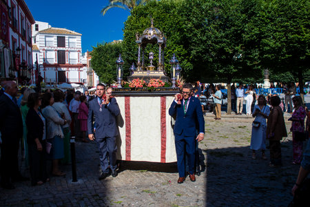 Honorary citizen participating in the Corpus Christi procession, their mission is to carry the religious statues. This age-old tradition of the Catholic faith to process the real presence of Jesus. Eucharistic processions take place in the narrow streets のeditorial素材
