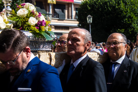 Honorary citizen participating in the Corpus Christi procession, their mission is to carry the religious statues. This age-old tradition of the Catholic faith to process the real presence of Jesus. Eucharistic processions take place in the narrow streets のeditorial素材
