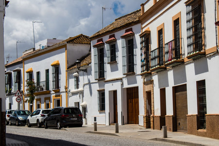 Carmona, Spain - June 10, 2023 Architecture and cityscape of Carmona's town. View of the narrow white streets of one of the oldest cities in Europe and an emblematic place in Andalusia, southern Spainのeditorial素材