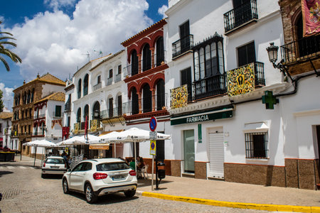 Carmona, Spain - June 10, 2023 Architecture and cityscape of Carmona's town. View of the narrow white streets of one of the oldest cities in Europe and an emblematic place in Andalusia, southern Spainのeditorial素材