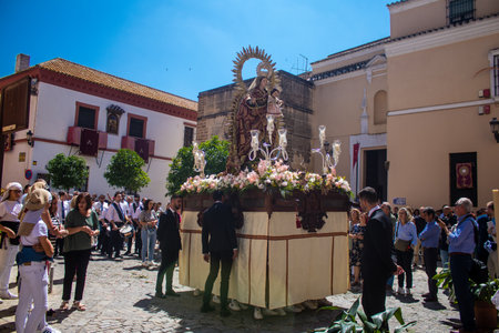 Honorary citizen participating in the Corpus Christi procession, their mission is to carry the...