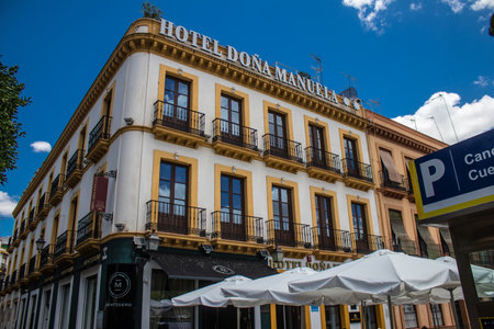 Sevilla, Spain - June 13, 2023 Architecture and cityscape of the city center of Sevilla, an emblematic city and the capital of Andalusia.のeditorial素材