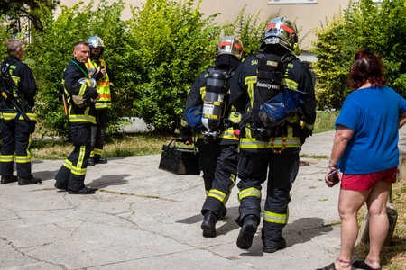 Firefighters are working to put out a fire that broke out in one of the buildings in the Croix Rouge district of Reims in France. Firefighters acted quickly and the fire was contained.のeditorial素材