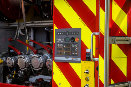 Reims, France - June 26, 2023 Firetruck of firefighters in intervention in a building on fire in...
