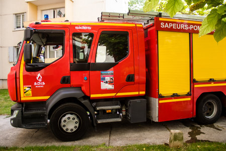 Reims, France - June 26, 2023 Firetruck of firefighters in intervention in a building on fire in Reims, Franceのeditorial素材