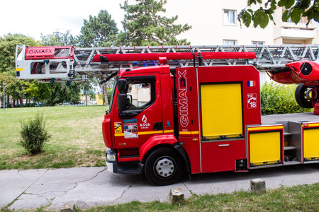 Reims, France - June 26, 2023 Firetruck of firefighters in intervention in a building on fire in Reims, Franceのeditorial素材