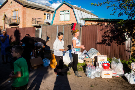 The few civilians residing in the village of Kam'yanka in Ukraine receive aid from humanitarian organizations. People live without water and electricity. The Russian army was driven out by the Ukrainians after several months of occupation.のeditorial素材
