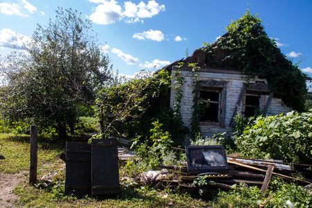 Damaged building located in the town of Kam'yanka. Civilian infrastructures are the privileged target of the Russian army. Russia invaded Ukraine and heavy fighting took place in this area.のeditorial素材
