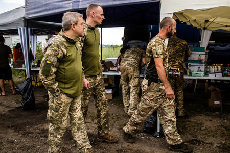 The volunteers of this humanitarian association offer free meals and food to the soldiers of the Ukrainian armed forces. They mobilize regularly and move to areas very close to the front line to provide support to the soldiers.のeditorial素材