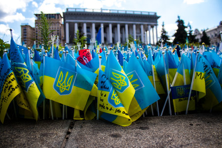 Thousands of flags have been planted at the makeshift memorial for fallen soldiers in Maidan Square in Kyiv. Each flag is a tribute to someone who was killed by Russia's war in Ukraine. The flags of different countries whose fighters are nationals are repのeditorial素材
