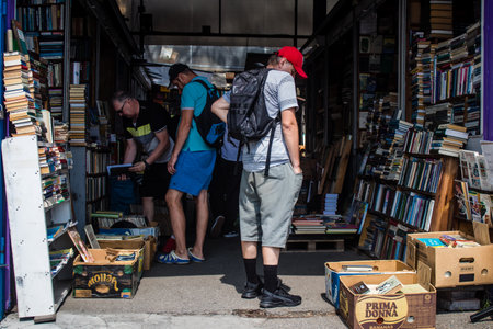 People shopping at book market Petrivka located in Kyiv, Ukraine. Famous for its great range of...