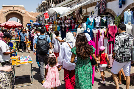 Essaouira, Morocco - August 20, 2023 People visiting the souk of Essaouira, a traditional Arab markets that offer all kinds of products located in the medina of the old city.のeditorial素材