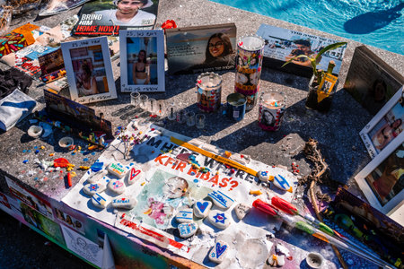 Tel Aviv, Israel - December 15, 2023. Dizengoff Square Memorial, Gifts and posters of the faces of...