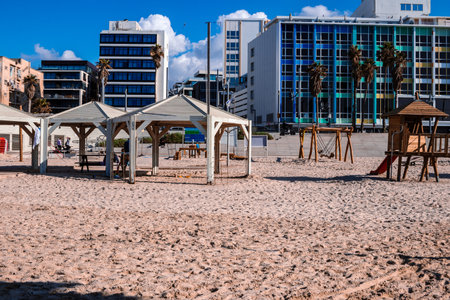 Tel Aviv, Israel - December 14, 2023 Beaches are known for their cleanliness. People often go there to surf, swim and sunbathe. Pleasant temperatures in Israel allow you to go to the beach every day.のeditorial素材