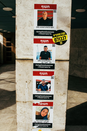 Tel Aviv, Israel - December 10, 2023 Posters of the face of the hostages kidnapped by Hamas during...