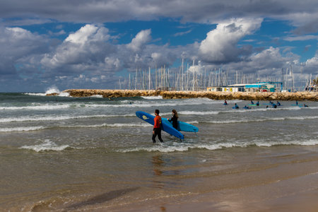 Tel Aviv, Israel - December 13, 2023 Beaches are known for their cleanliness. People often go there to surf, swim and sunbathe. Pleasant temperatures in Israel allow you to go to the beach every day.のeditorial素材