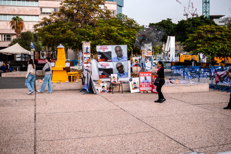 Tel Aviv, Israel - December 10, 2023 People gathered in front of the Tel Aviv Museum of Art, on what is now known as Hostages Square. People displayed photos of Hamas hostages and messages of supportのeditorial素材