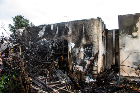 Kfar Aza kibbutz, Israel - January 29, 2024 Houses were burned and received numerous hits from...